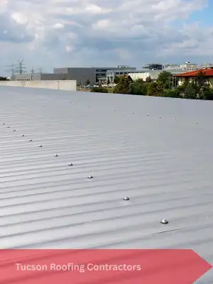 Residential metal roof replacement in Tucson AZ with expert roofers installing durable and energy-efficient metal roofing for local homes.